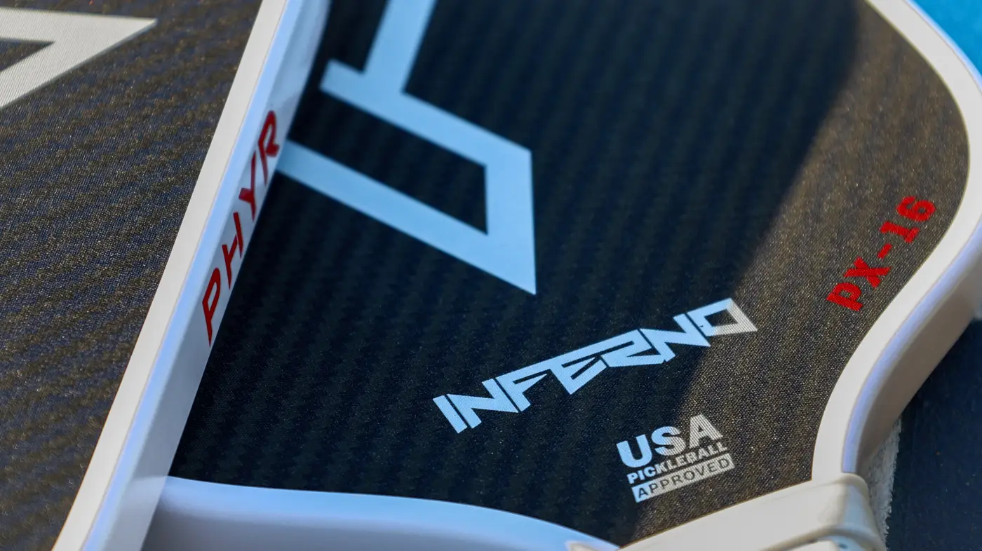 Inferno paddle face at an angle, carbon weave detail